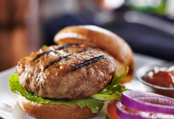 Turkey Burger on a bun with salad